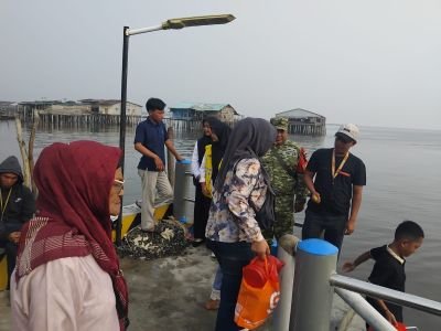 Pos Ramil Panipahan 04/Kubu dan KPLP Awasi Pergerakan Penumpang di Pelabuhan Obak